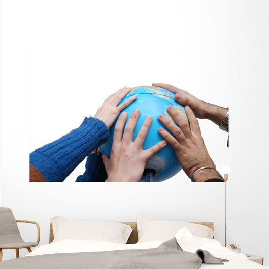 Teamwok concept with hands on globe Wall Decal