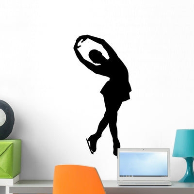 Woman Figure Skater Wall Mural shown on a wall