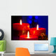 Christmas candles with blurry lights on background Wall Mural