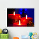 Christmas candles with blurry lights on background Wall Mural