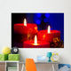 Christmas candles with blurry lights on background Wall Mural