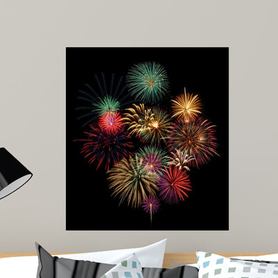 Festive and Colorful Fireworks shown on a wall