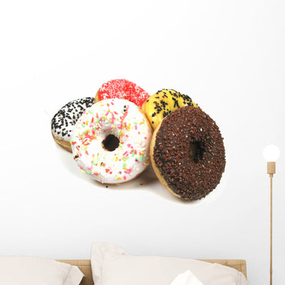 Different Donuts Wall Decal shown on a wall