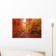 Magnificent colors of autumn forest road in October Wall Mural