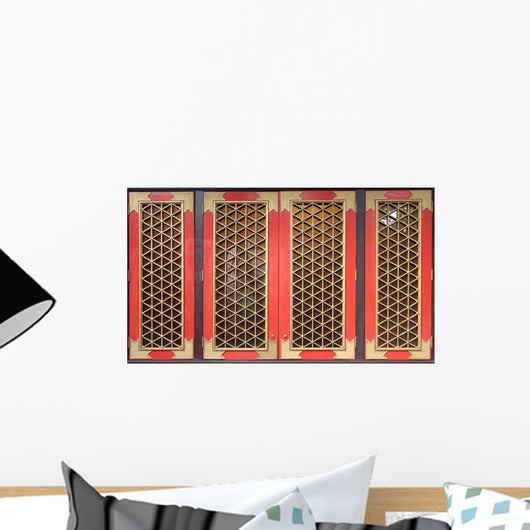 Traditional Chinese red wooden windows with golden grids. Wall Mural