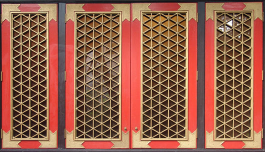 Traditional Chinese red wooden windows with golden grids. Wall Mural