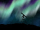 Silhouette Telescope under Aurora