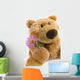 Soft Toy the Bear  with a Flower on a White Background Wall Decal