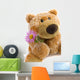 Soft Toy the Bear  with a Flower on a White Background Wall Decal