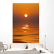 Sun Setting in a Calm Sea Wall Mural