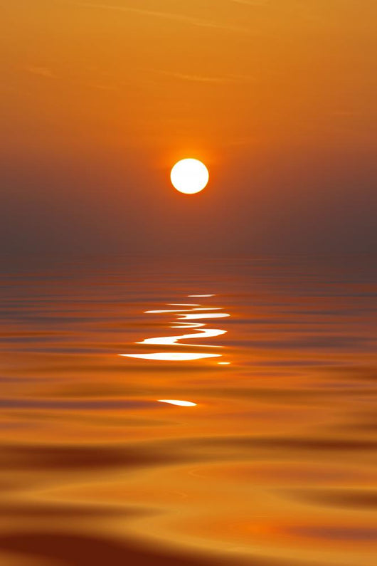 Sun Setting in a Calm Sea Wall Mural
