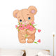 Teddy Bear Giving Hearts