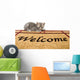 Kitten and welcome mat Wall Mural
