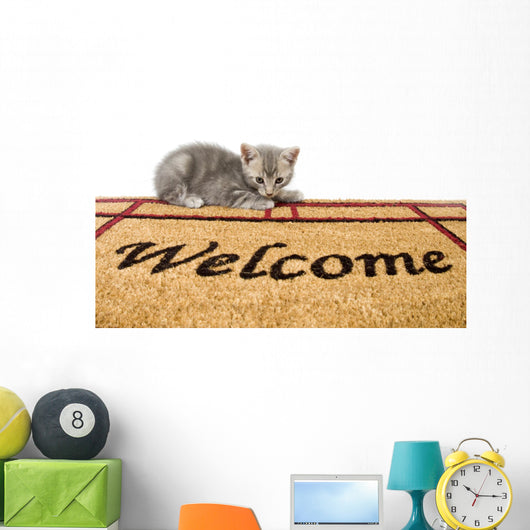 Kitten and welcome mat Wall Mural
