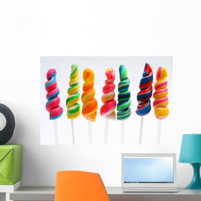 Colorful Twirly Lollipop Wall Decal shown on a wall