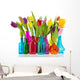 Colorful tulips in glass vases Wall Mural