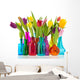 Colorful tulips in glass vases Wall Mural