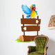 A colorful bird and the signboard Wall Decal