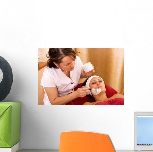 young woman in beauty salon, beauty mask Wall Mural