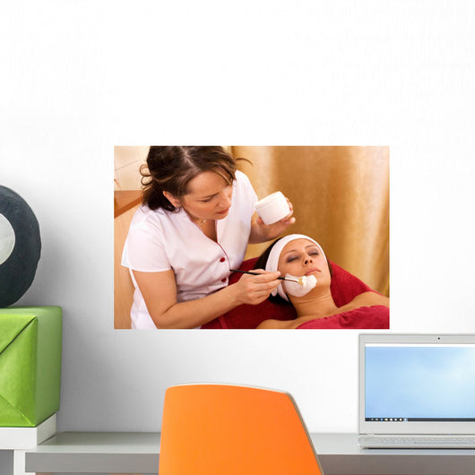 young woman in beauty salon, beauty mask Wall Mural
