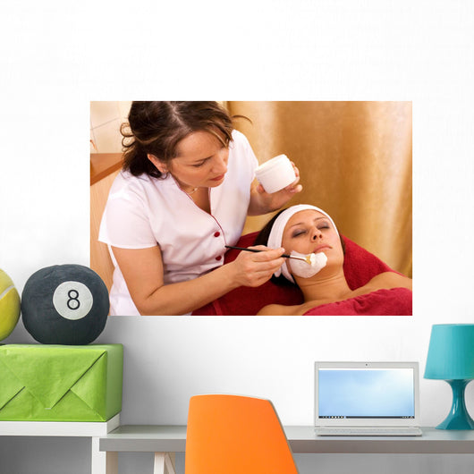 young woman in beauty salon, beauty mask Wall Mural