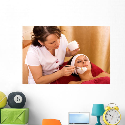 young woman in beauty salon, beauty mask Wall Mural