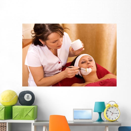 young woman in beauty salon, beauty mask Wall Mural