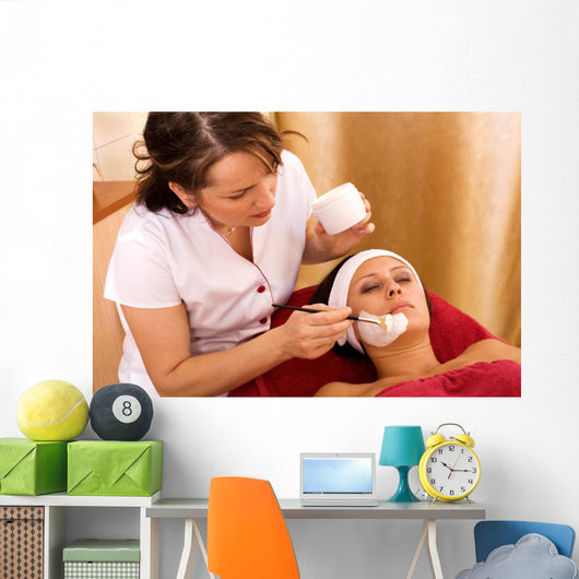 young woman in beauty salon, beauty mask Wall Mural