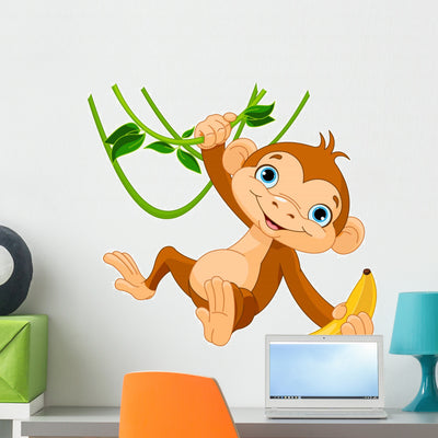 Baby Monkey Tree Wall Decal shown on a wall