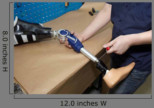 Technician Adjusts Prosthetic Foot
