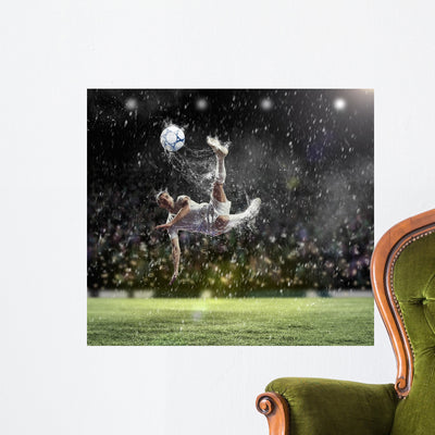 Football Player Striking Ball shown on a wall