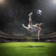 Football Player Striking Ball