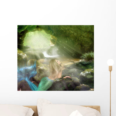 Young Blonde Mermaid shown on a wall