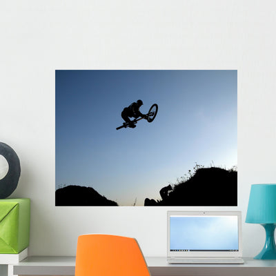 Mountain Bike Jump Wall Mural shown on a wall