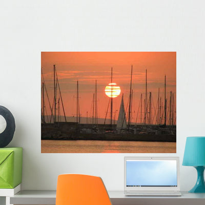 Sunset Over Docked Boats Wall Decal shown on a wall