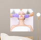 Young woman receiving beauty therapy Wall Mural