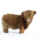 Young Highland Cattle standing in the snow Wall Decal