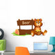 Bear Holding Honey beside Wall Mural