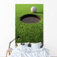 Golf Ball On Lip Of Cup Wall Mural