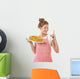 Beautiful young girl with pancakes Wall Decal