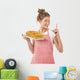 Beautiful young girl with pancakes Wall Decal