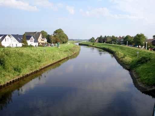 River Cutting Through Small Town Wall Decal