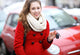 Young Woman Showing Car