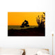 Quad Bike Jumping on Beach at Sunset Wall Mural