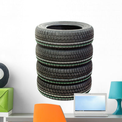 Four New Tires Stacked Wall Decal shown on a wall