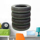 Four new tires stacked on white background Wall Decal