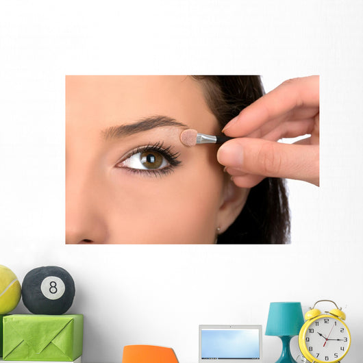 Close up look of applying eyeshadow with applicator Wall Mural