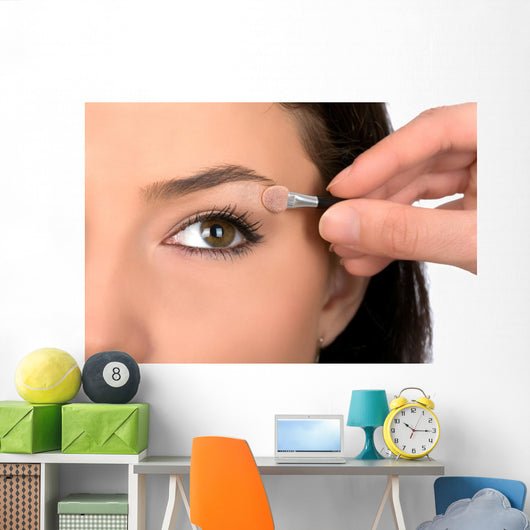 Close up look of applying eyeshadow with applicator Wall Mural
