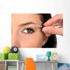 Close up look of applying eyeshadow with applicator Wall Mural
