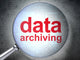 Information concept: optical glass with words Data Archiving Wall Mural
